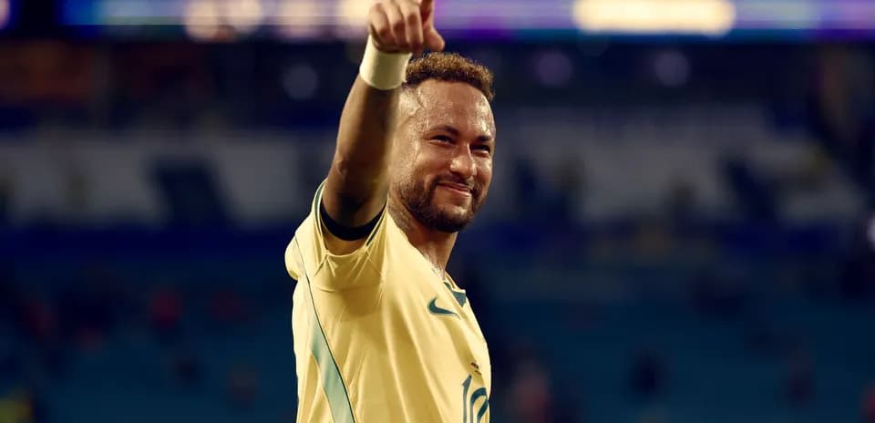Jugador de fútbol celebrando con el dedo levantado