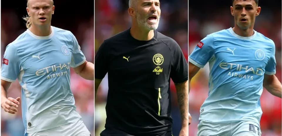 Jugadores de Manchester City en acción durante el partido