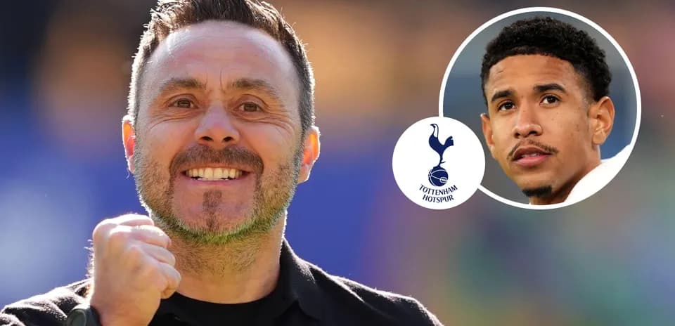 Entrenador sonriente de Tottenham Hotspur con jugador