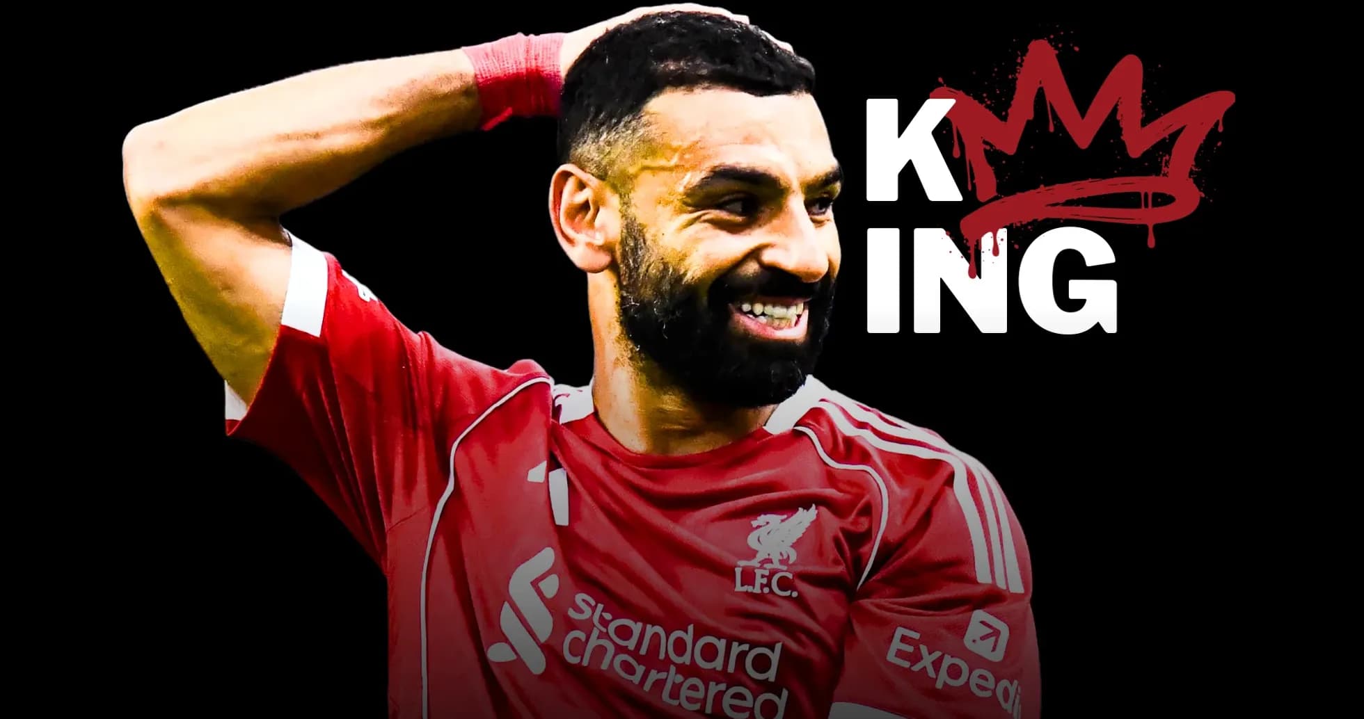 Jugador de Liverpool celebrando con camiseta roja