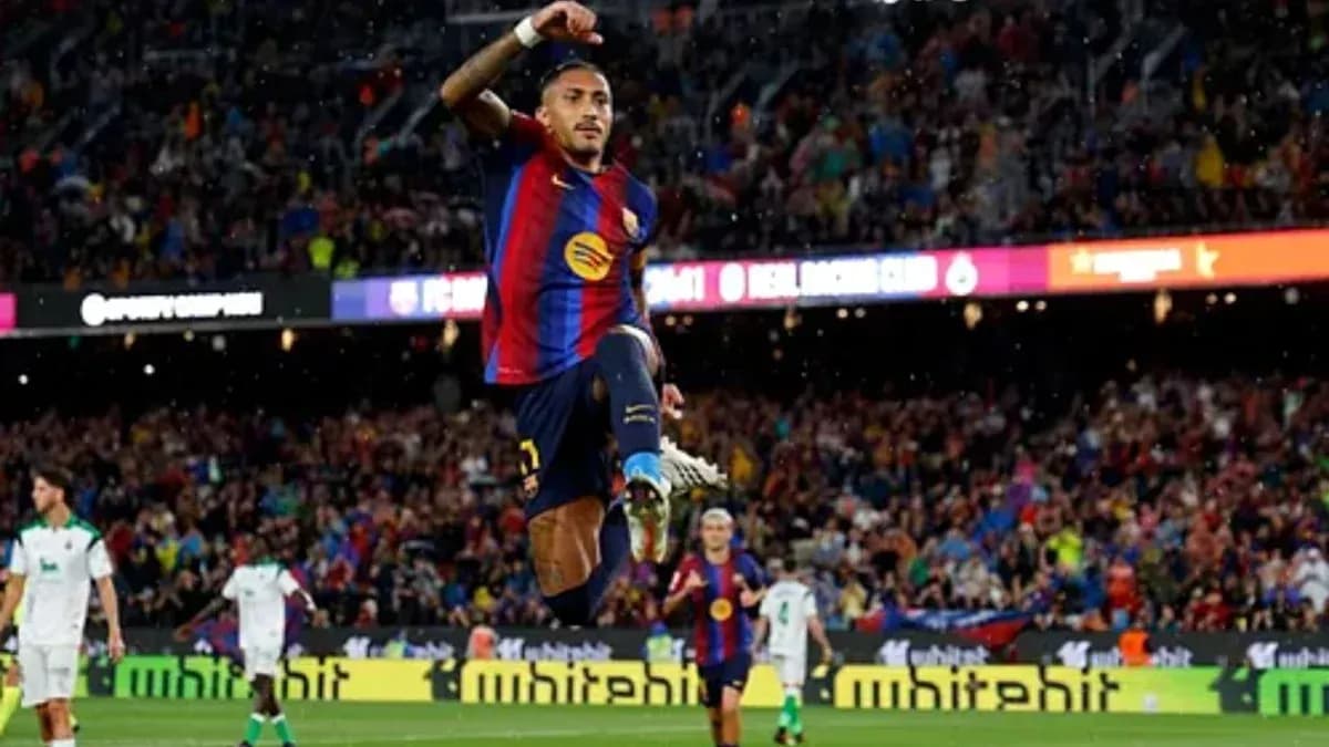 Jugador de FC Barcelona celebrando un gol en el estadio