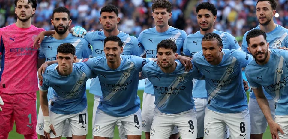Jugadores de Manchester City posando para la foto
