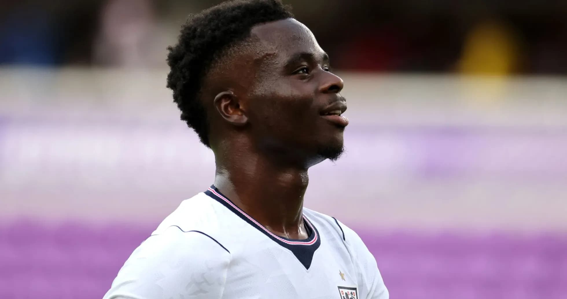 Jugador de Inglaterra sonriendo durante un partido