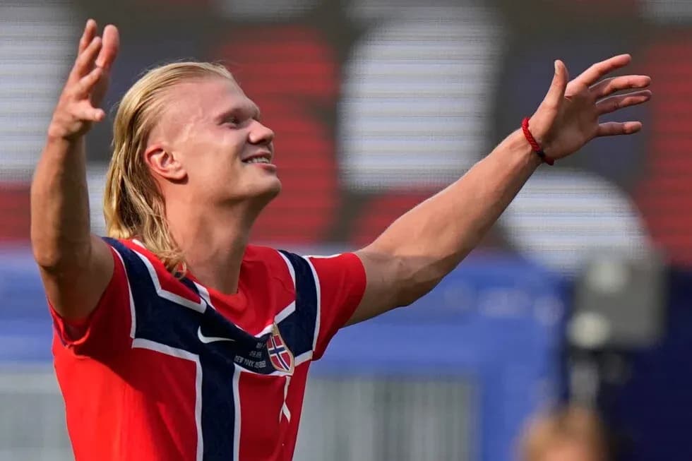 Jugador celebrando con los brazos extendidos