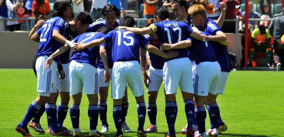 Jugadores de Japón en huddle antes del partido