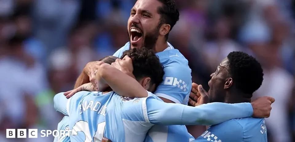 Jugadores de Manchester City celebrando un gol