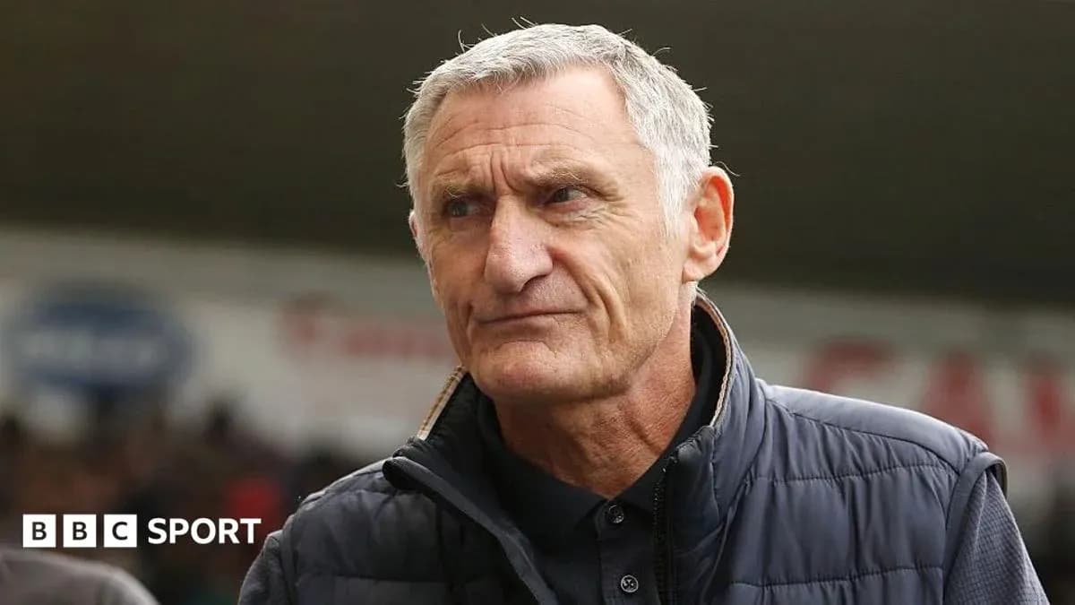 Entrenador mirando durante un evento deportivo