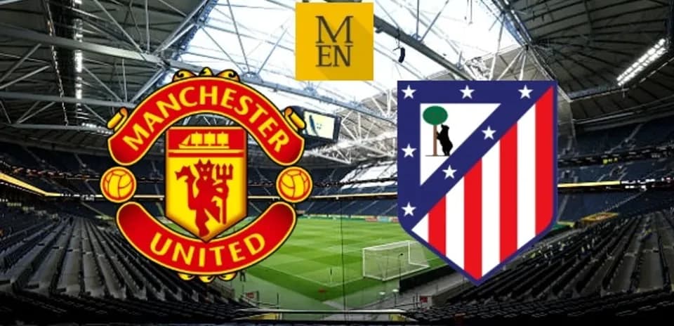 Logos de Manchester United y Atlético de Madrid en estadio