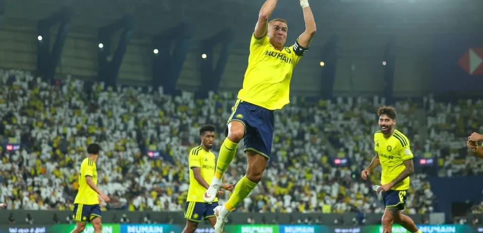 Jugador celebrando durante un partido de fútbol