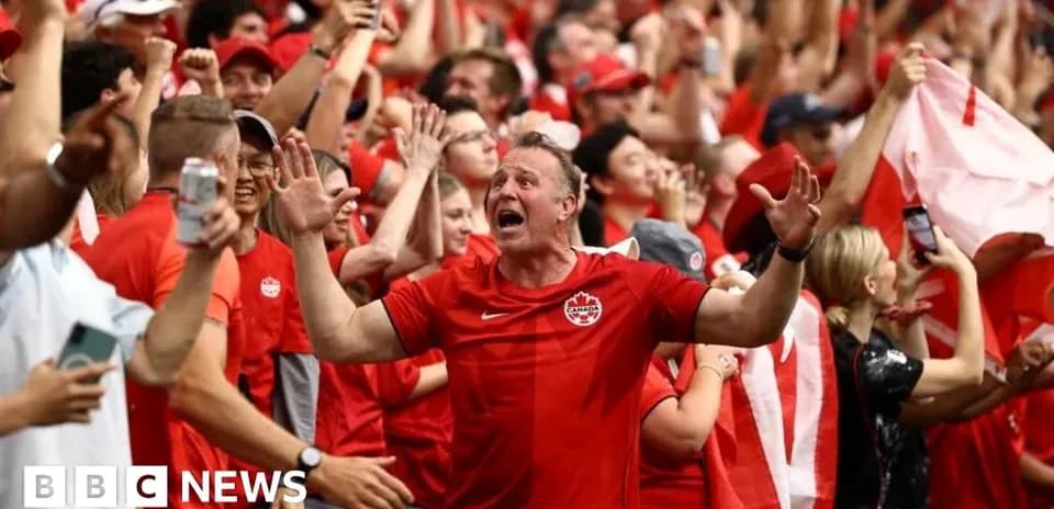 Aficionados animando en un evento deportivo