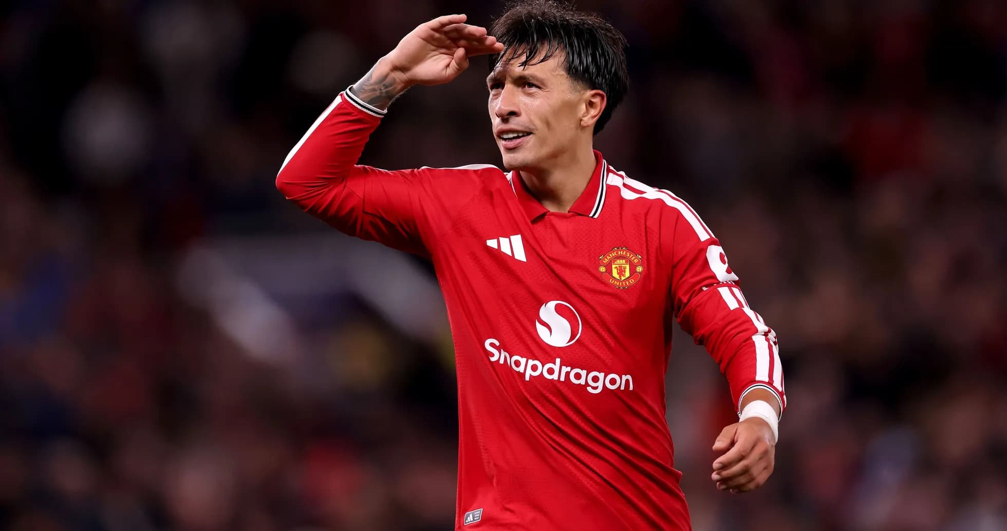 Jugador de Manchester United saludando desde el campo