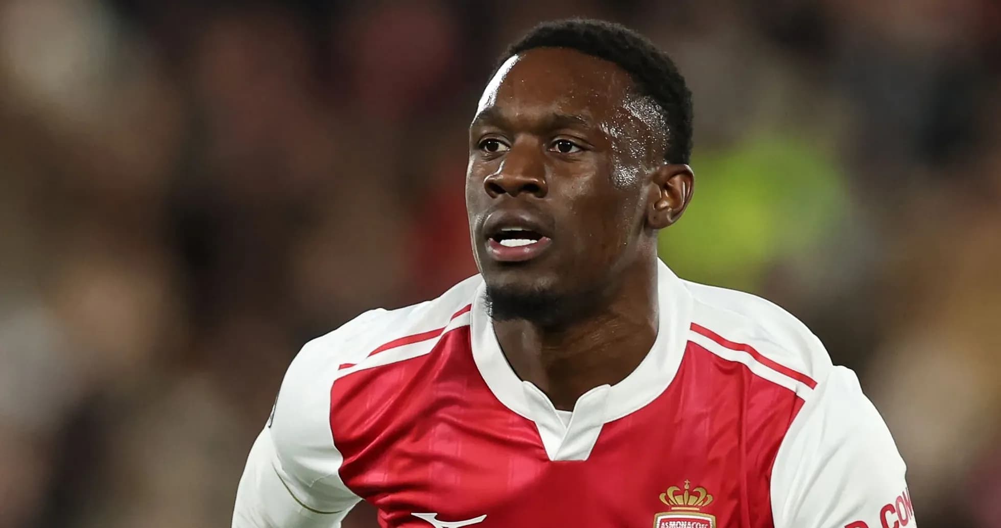 Jugador de AS Monaco corriendo en el campo