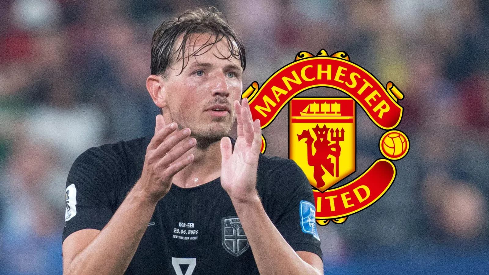 Jugador aplaudiendo con logo de Manchester United de fondo