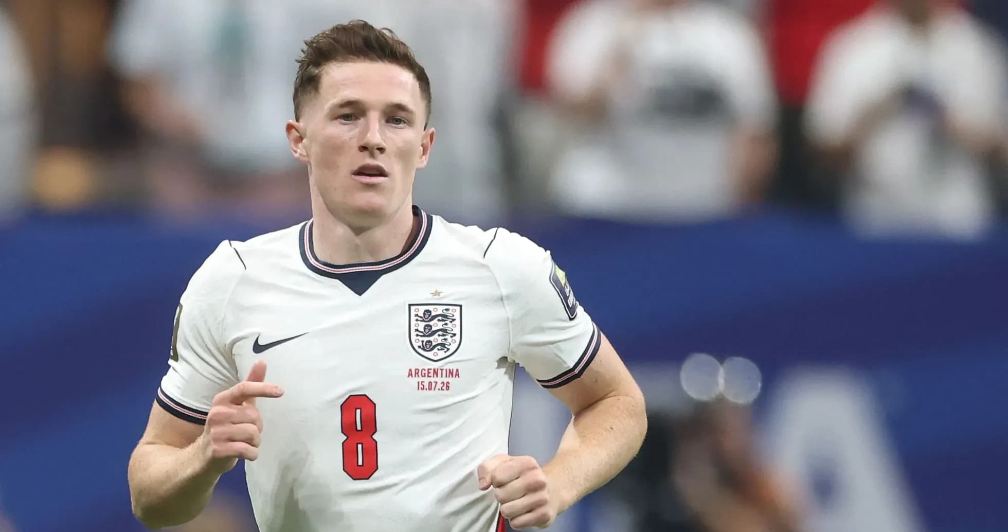 Jugador de Inglaterra corriendo en el campo de juego