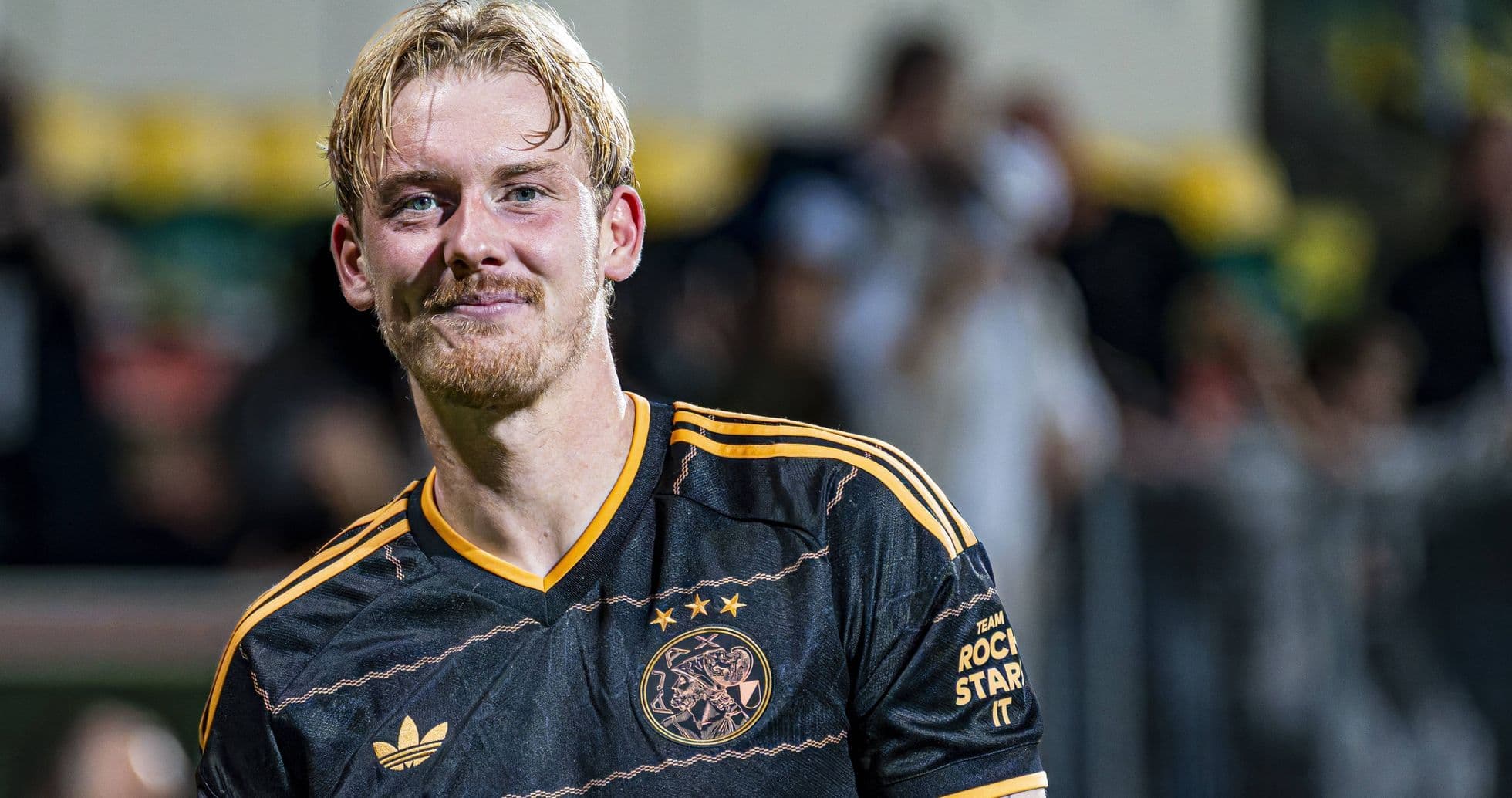 Jugador de Ajax sonriendo después del partido