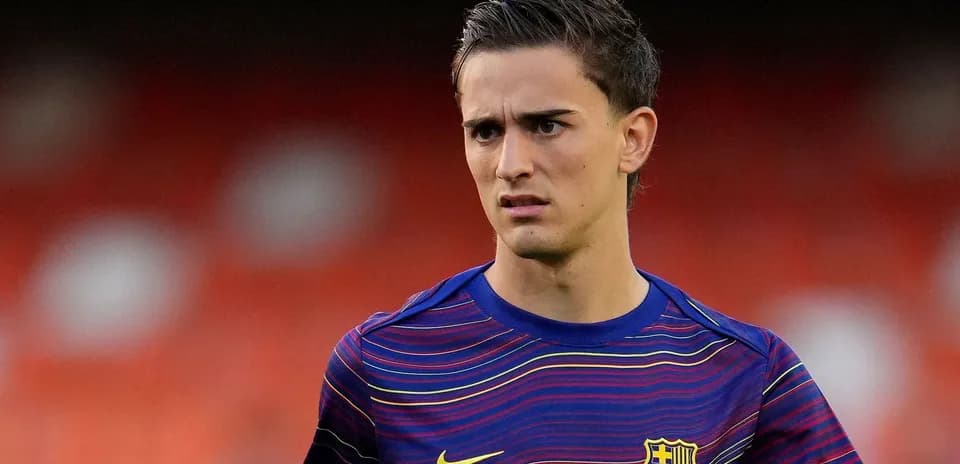 Jugador del FC Barcelona en calentamiento previo