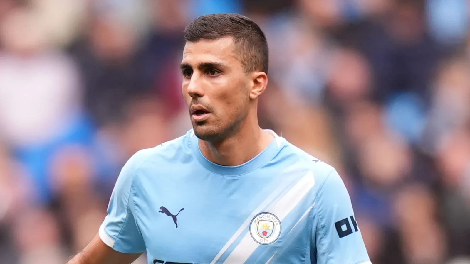 Jugador de Manchester City en acción durante un partido Jugador de Manchester City en acción durante un partido