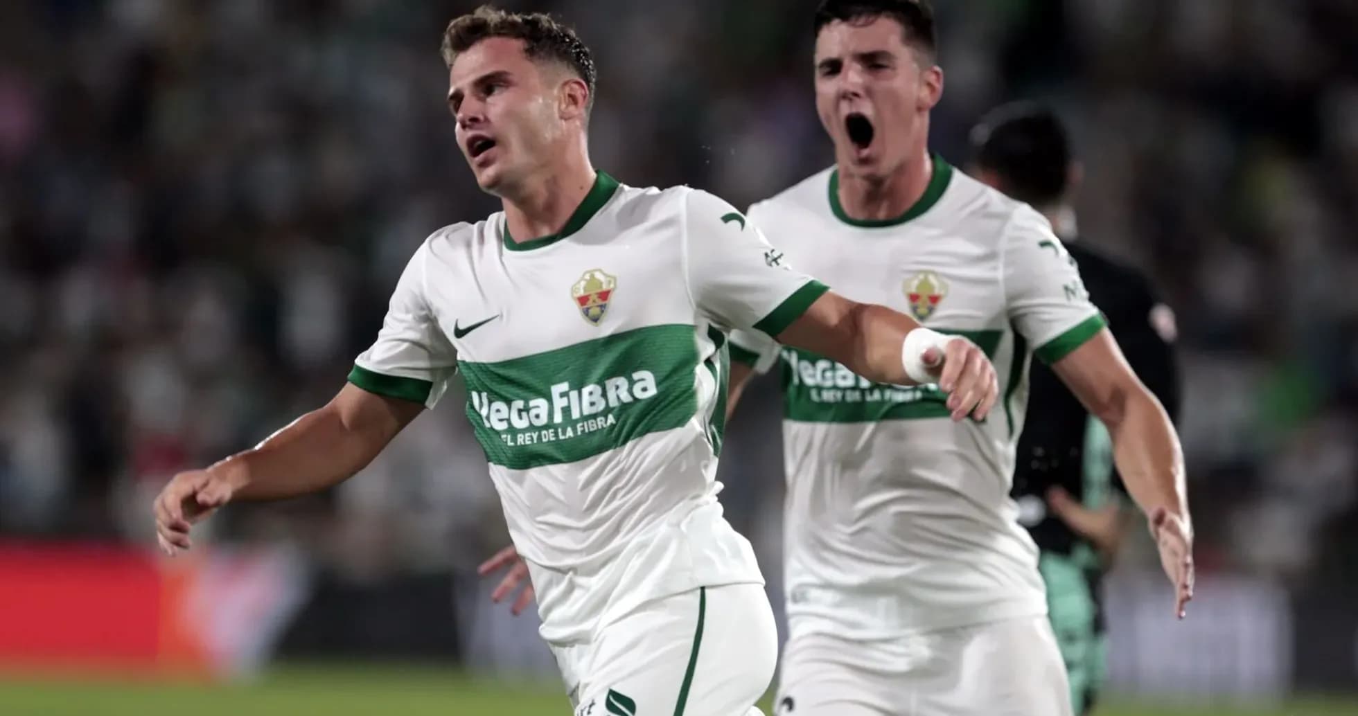 Jugadores de Elche celebrando un gol Jugadores de Elche celebrando un gol