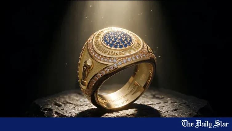 An illuminated championship ring displayed on a pedestal An illuminated championship ring displayed on a pedestal