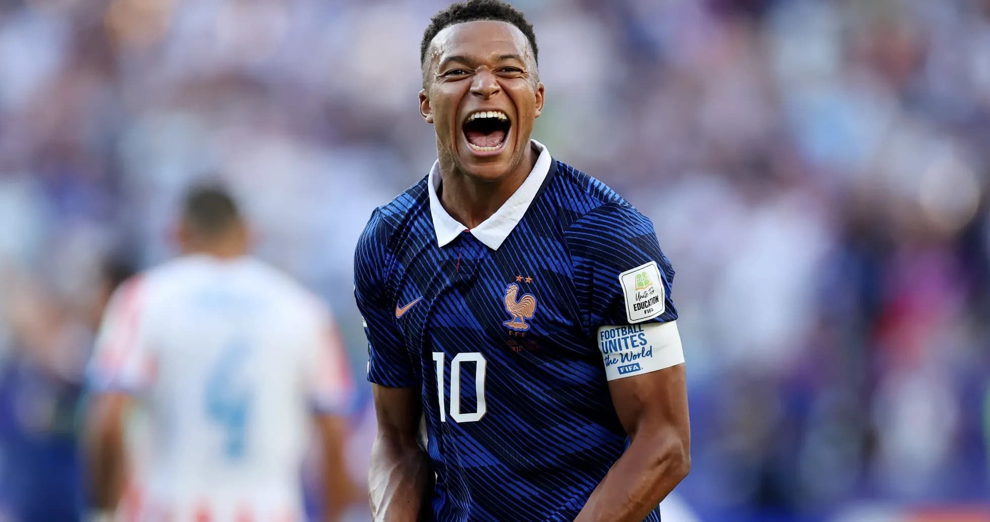 Jugador de Francia celebrando un gol en partido Jugador de Francia celebrando un gol en partido